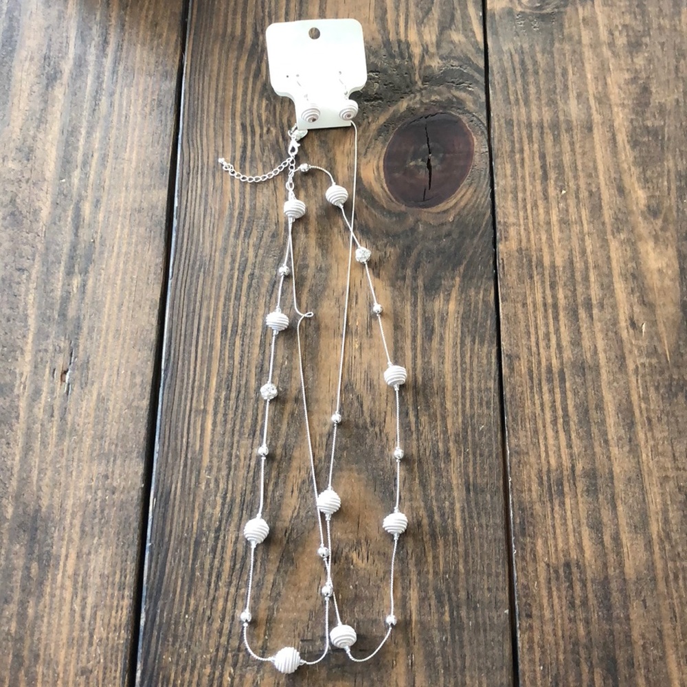 Silver necklace and earring set